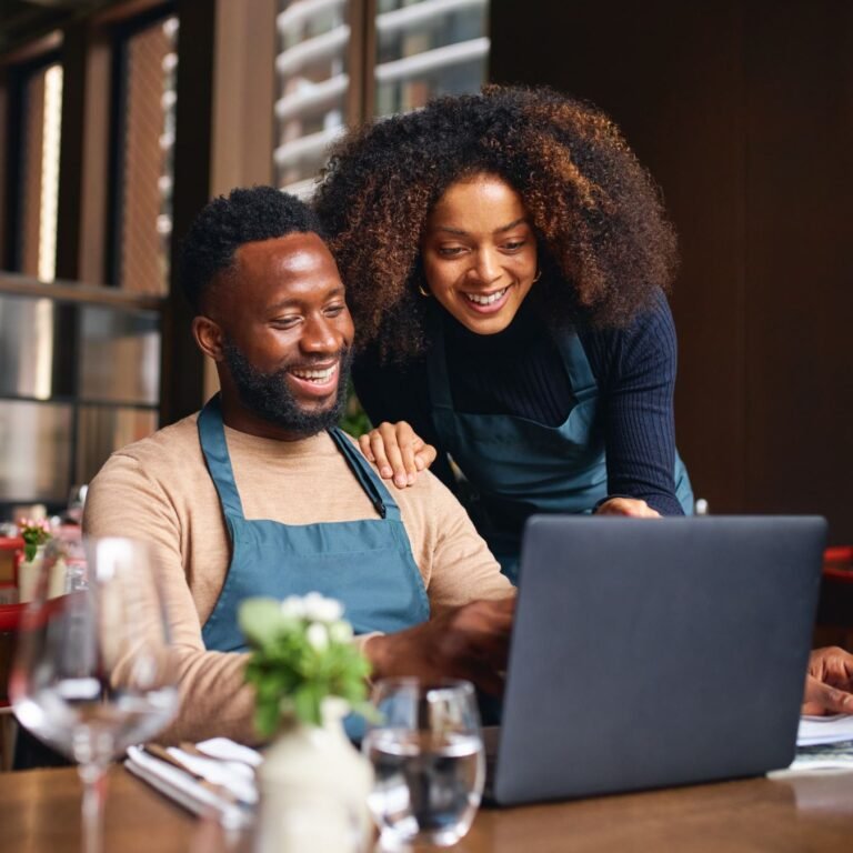happy couple running a small business